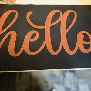 Unk Black and Orange 'Hello' Door Mat